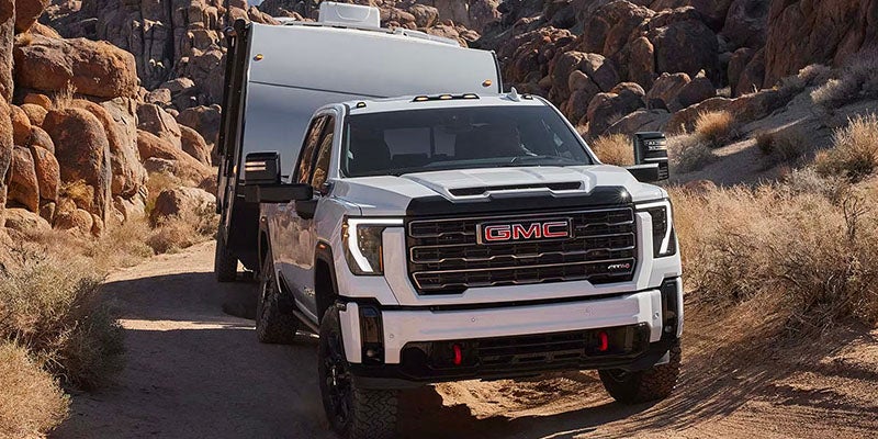 A white GMC Sierra 2500HD